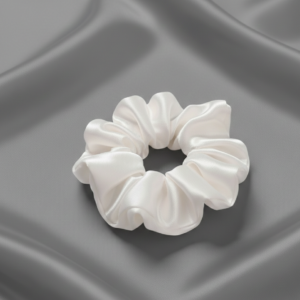 Single large 10cm white satin silk scrunchie on grey silk background
